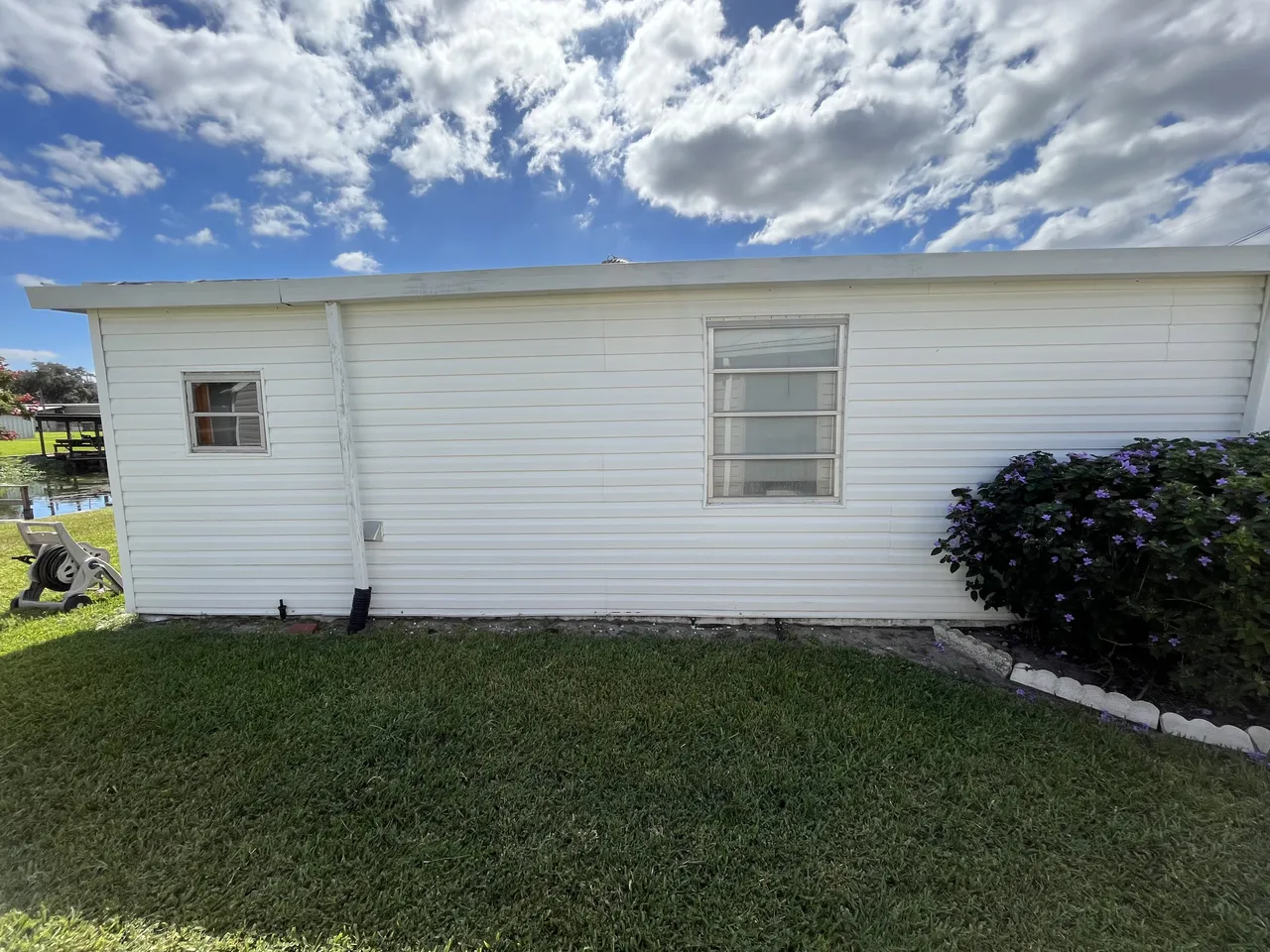 Clean house siding after soft wash